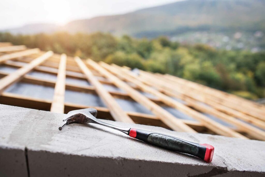 hammer on a roof being built